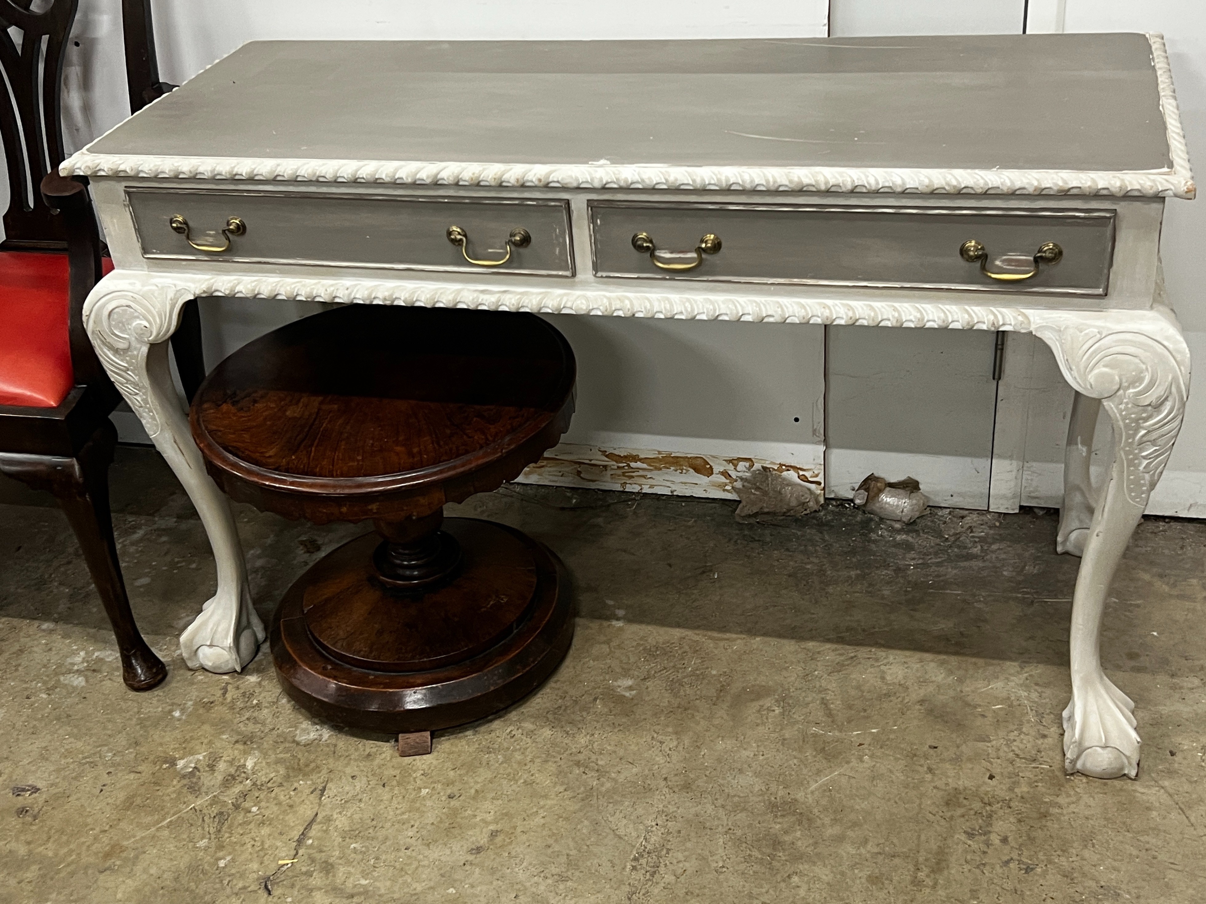 A Chippendale revival later painted two drawer console table, width 127cm, depth 53cm, height 77cm with similar arched mirror, height 120cm